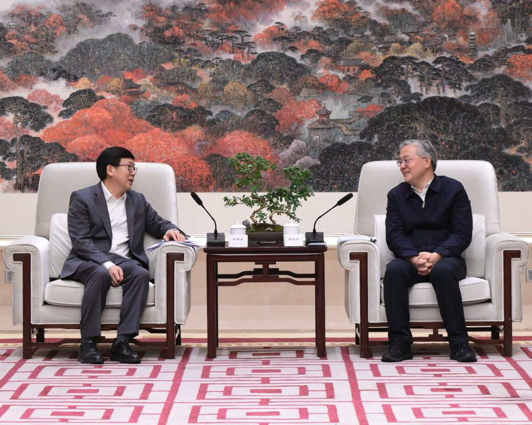廖家生与漯河市委书记周红波座谈